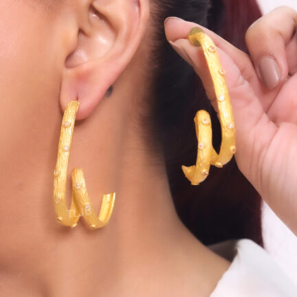 885C7447-F712-4E22-9A17-30B226570F5D Goldust twisted hammered hoops in matt