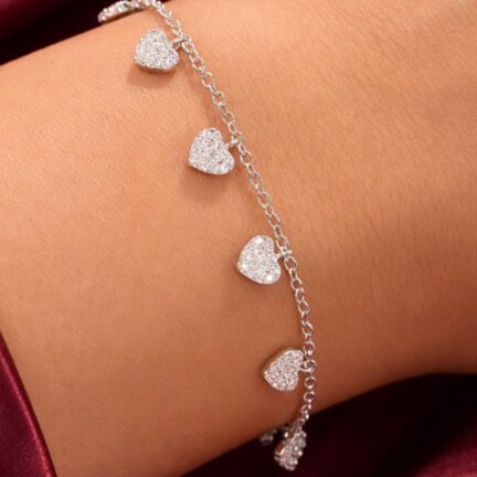 Platinum plated chain bracelet with cz heart charms