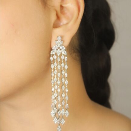 Delicate Peacock inspired danglers in Platinum plating