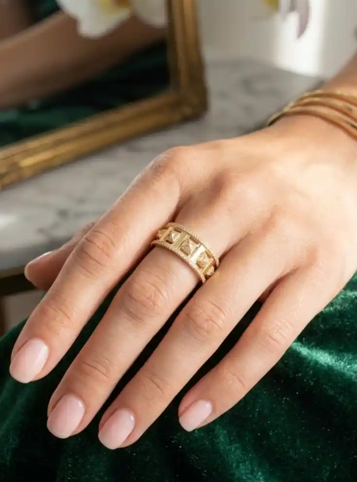 Adjustable gold plated CZ pyramid ring