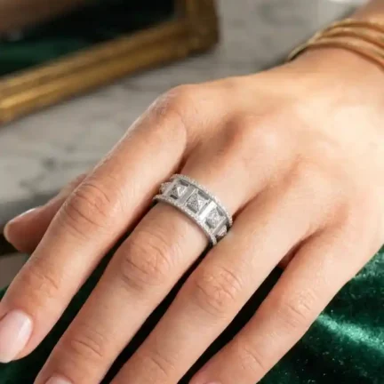 Adjustable platinum plated CZ pyramid ring