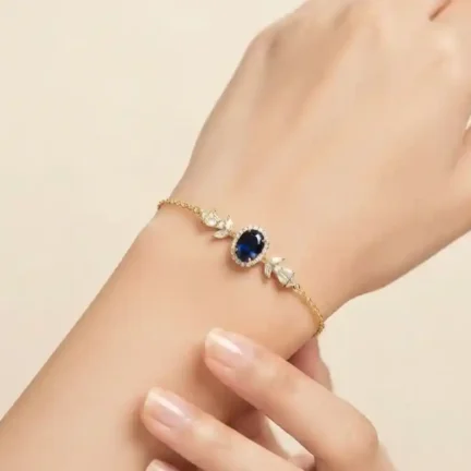 TLJB-L151-009-BR-1 Elegant Gold Plated Blue Oval CZ Halo Link Chain Bracelet