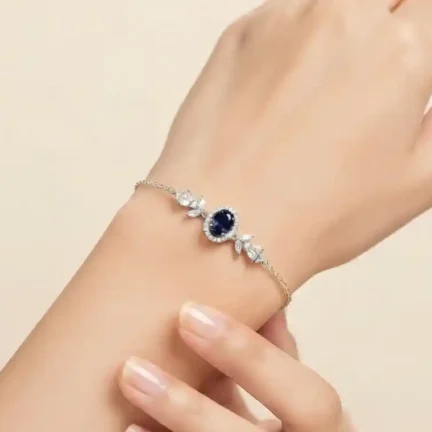 TLJB-L151-013-BR-1 Elegant Platinum Plated Blue Oval CZ Halo Link Chain Bracelet