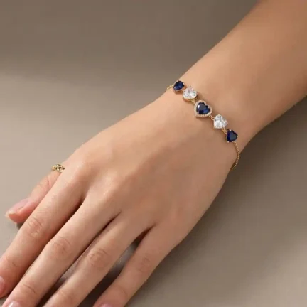 TLJB-L151-022-BR-1 Gold Plated Tapered Blue and Clear Heart CZ Adjustable Link Chain Bracelet