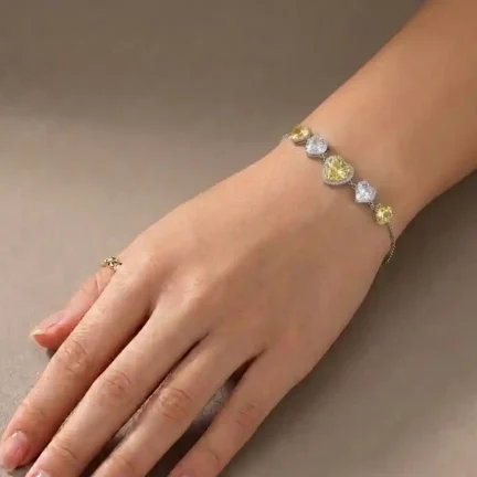TLJB-L151-027-BR-1 Platinum Plated Tapered Yellow and Clear Heart CZ Adjustable Link Chain Bracelet